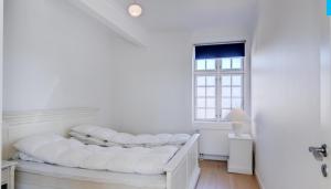 Katil atau katil-katil dalam bilik di Penthouse Apartment Skagen