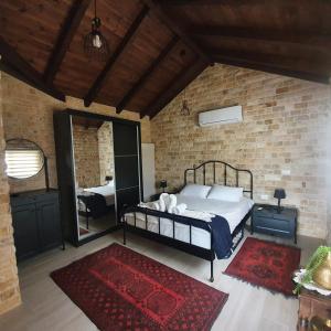 Postel nebo postele na pokoji v ubytování Al baidar zimmer
