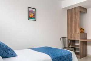 Llit o llits en una habitació de JUUB More Oaxaca Impossible (R1)