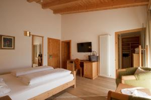 TV a/nebo společenská místnost v ubytování Hotel Gran Paradiso