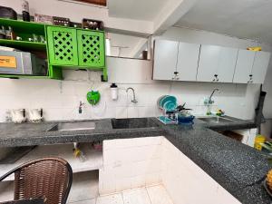Kuchyň nebo kuchyňský kout v ubytování Prisma Hostel + 37 fotografií