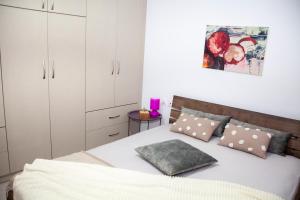Postel nebo postele na pokoji v ubytování Aelia