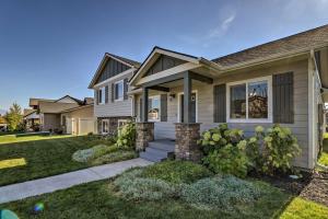 a house with a landscaping at Kalispell Home with 2 Suites about 35 Mi to Glacier in Kalispell