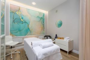 Posteľ alebo postele v izbe v ubytovaní Aparthotel Etna