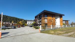 a building on the side of a street at M&V Studio Aspen Valley in Razlog