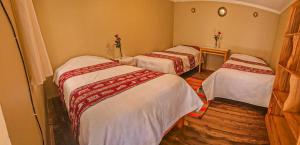Letto o letti in una camera di Hotel Willcamayu