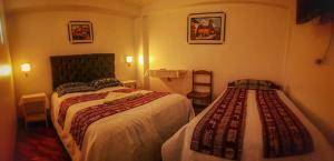 Letto o letti in una camera di Hotel Willcamayu