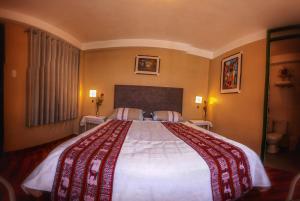 Letto o letti in una camera di Hotel Willcamayu