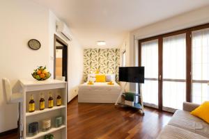 Posteľ alebo postele v izbe v ubytovaní Residenza Smeraldo - Terrazza San siro