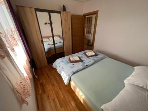 Postel nebo postele na pokoji v ubytování Vila Mana