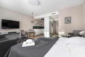 Posteľ alebo postele v izbe v ubytovaní Aparthotel Etna