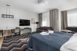 Posteľ alebo postele v izbe v ubytovaní Aparthotel Etna