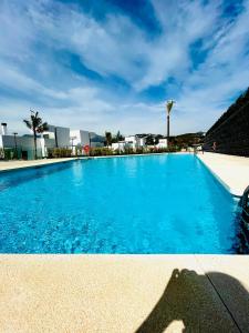 Poolen vid eller i närheten av Exclusive New Apartment within Santa Clara and Marbella Golf & Country Club