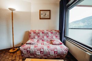 Istumisnurk majutusasutuses Nice Studio with balcony ski-in ski-out chairlift 5 mins walk