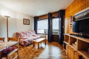 Istumisnurk majutusasutuses Nice Studio with balcony ski-in ski-out chairlift 5 mins walk