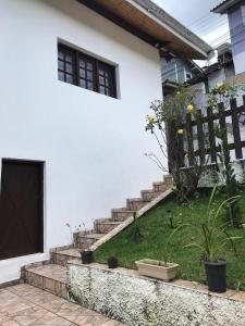 Κήπος έξω από το casa campos do Jordão