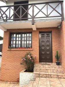 Η πρόσοψη ή η είσοδος του casa campos do Jordão