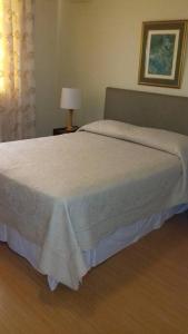 Łóżko lub łóżka w pokoju w obiekcie Residencial Kontiki Miraflores