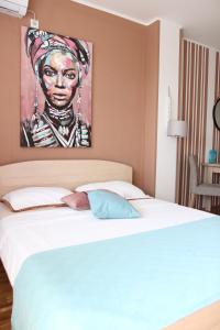Postel nebo postele na pokoji v ubytování Apartmani Elixir