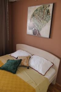 Postel nebo postele na pokoji v ubytování Apartmani Elixir