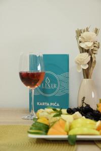Nápoje v ubytování Apartmani Elixir