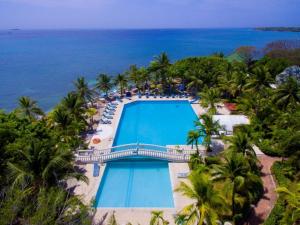 an aerial view of the pool at the resort at Hotel Cocoliso Island Resort in Isla Grande