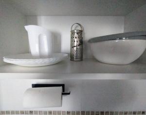 a counter with a sink and a bowl on it at Minicasa moderna in Castelar +4 photos