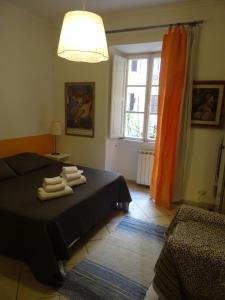 A bed or beds in a room at Linnéa Roma Centro A