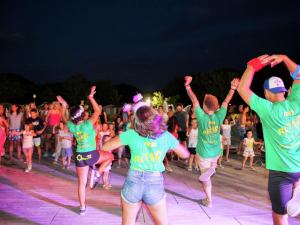 a group of people dancing in front of a crowd at Mobile Home in Cesenatico by Adriatic Sea in Cesenatico +32 photos