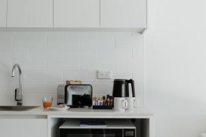 卡拉拉海滩Beach & Bay Stay Motel的相册照片