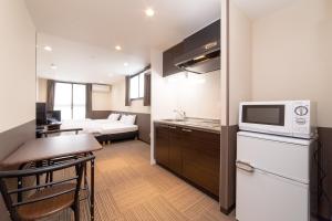 A cozinha ou kitchenette de Le Studio 五条高倉