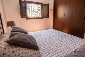 Posteľ alebo postele v izbe v ubytovaní El Velero Sotillo La Jarana Piscina Parking wifi