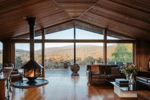 a living room with a view of a mountain at Kangaroo Manor in Yarra Junction