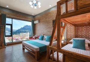 Krevet ili kreveti u jedinici u okviru objekta Leisurely River View Inn - Three Gorges Branch