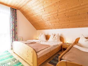 Posteľ alebo postele v izbe v ubytovaní Chalet in Alps with Private Sauna