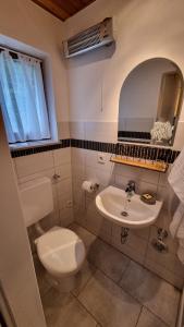 Koupelna v ubytování Germanus Ferienwohnung + 22 fotografií