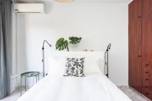 Ένα ή περισσότερα κρεβάτια σε δωμάτιο στο Home2Book Caletillas Breeze & Comfort