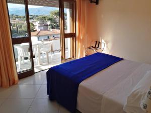 Postel nebo postele na pokoji v ubytování Hotel Elizabeth