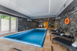 Bazén v ubytovaní Hotel Smile Pieniny alebo v jeho blízkosti
