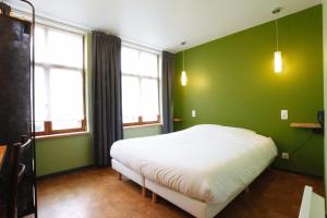Postel nebo postele na pokoji v ubytování Hotel O Mal Aime + 18 fotografií