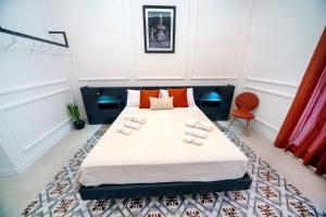 Postel nebo postele na pokoji v ubytování B&B Riccioli