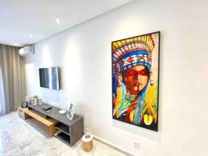a large painting on a wall in a room at GAUTHIER Living By ShortStayCasa 1BED or 2BEDS - THE HEART OF TOWN in Casablanca