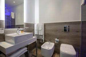 Kúpeľňa v ubytovaní Luxmarì Hotel & Spa