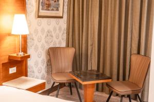 Posezení v ubytování Elegance Hotel