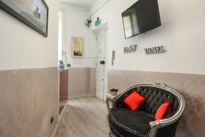 TV a/nebo společenská místnost v ubytování Cola Di Rienzo Suite Guest House