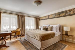 Postel nebo postele na pokoji v ubytování Hotel Nerudova 211