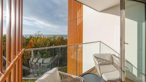 En balkong eller terrasse på Apartamenty Sun & Snow Pinea