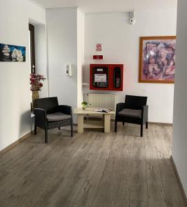 Posezení v ubytování Hotel Sir Lujerului + 27 fotografií