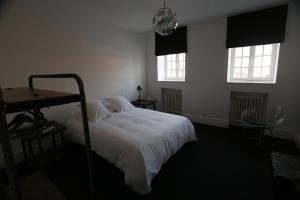Postel nebo postele na pokoji v ubytování B&B Le Cercle De Malines