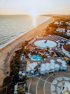an aerial view of a resort on the beach at Vale Do Lobo Resort in Vale do Lobo
